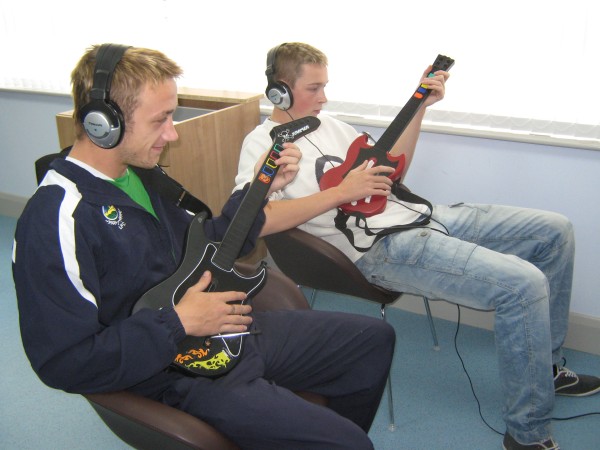 Stuart and Graham playing Guitar Hero